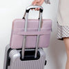 sacoche ordinateur qui s'accroche a une valise