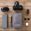 Petite trousse pour câble et chargeur un essentiel pour photographe 